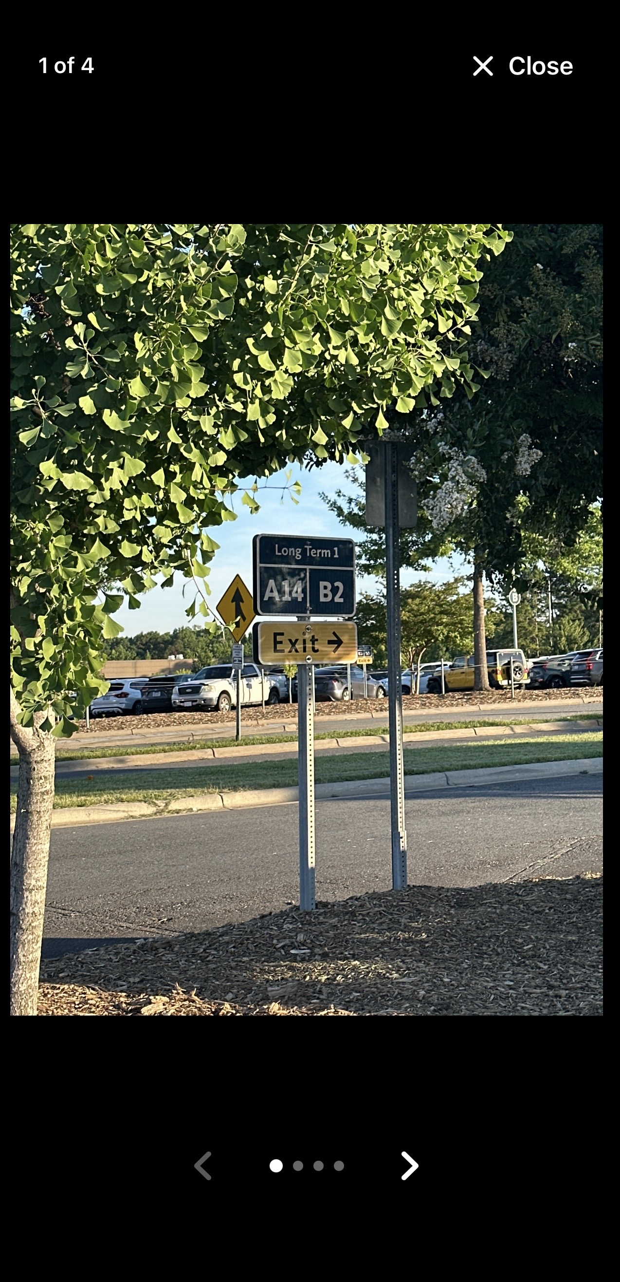 JustTap full-screen parking photo viewer with close, previous, next, and page controls